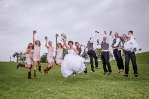 un bridal party jumping celebration in Houston TX by Houston wedding photographer Elio Photography