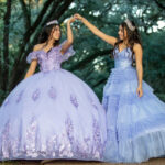 Quinceañera-Romina & Camila 6 Houston Wedding Photographer Romina and Camilla holding hands in ballgowns during a joint Quinceañera photoshoot at Rice University in Houston
